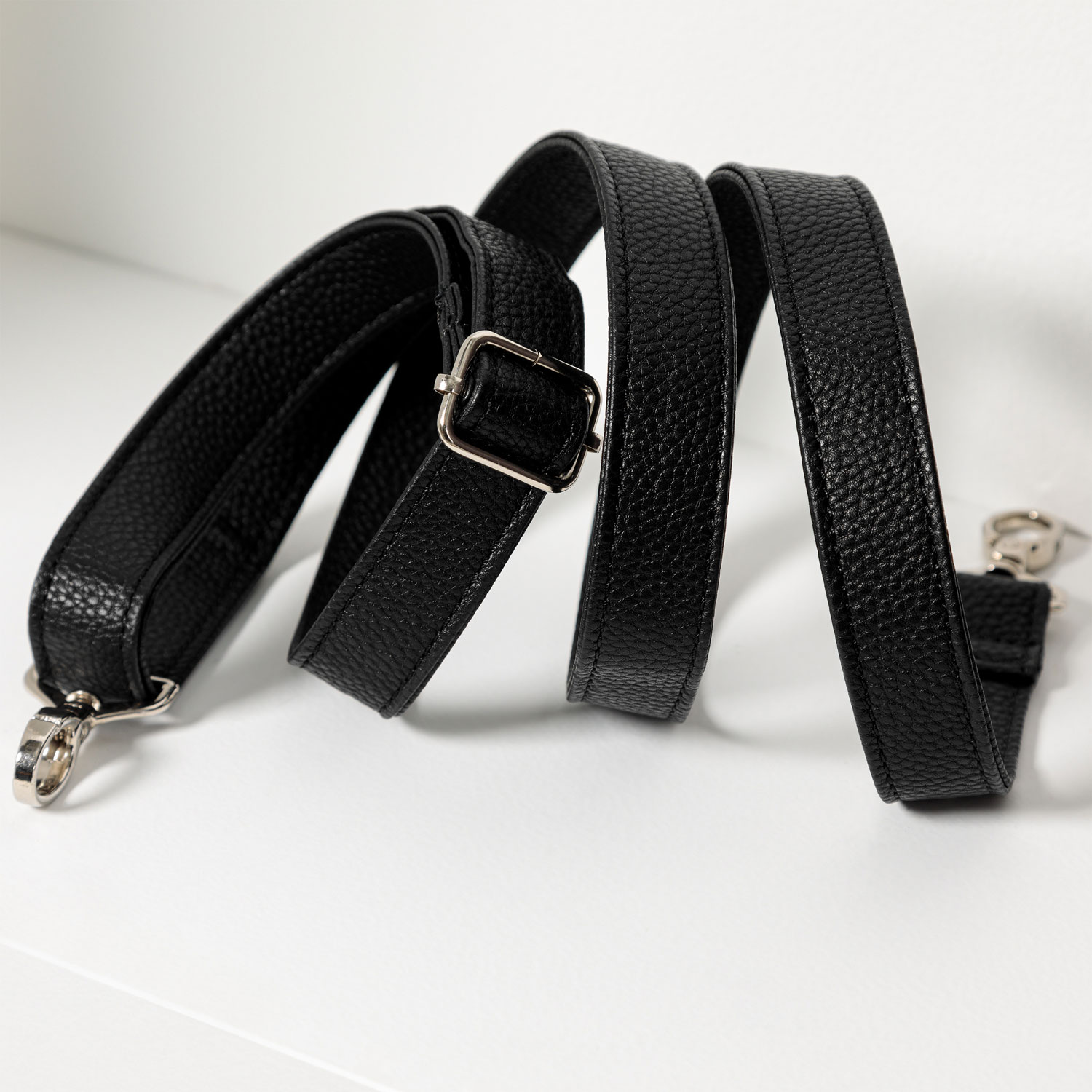 black leather crossbody strap
